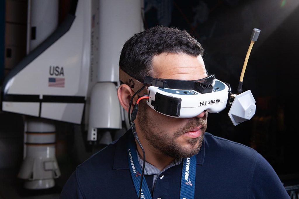 Alberto Diaz wearing the first-person view headset for the FPV drones