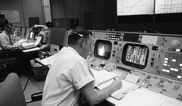 Date Created: 1968-12-21 Clifford E. Charlesworth, Apollo 8 "Green Team" flight director, is seated at his console in the Mission Operations Control Room in the Mission Control Center, Building 30, during the launch of the Apollo 8 (Spacecraft 103/Saturn 503) manned lunar orbit space mission.